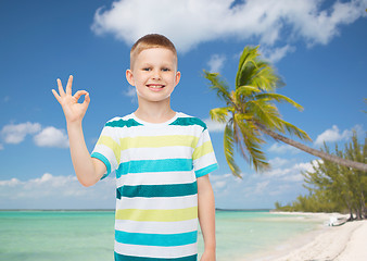 Image showing little boy in casual clothes making ok sign
