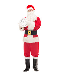 Image showing man in costume of santa claus with clock