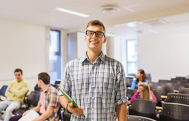 Image showing group of smiling students in lecture hall