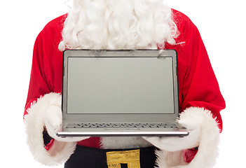 Image showing close up of santa claus with laptop