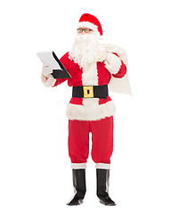 Image showing man in costume of santa claus with notepad and bag