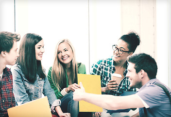 Image showing students communicating and laughing at school