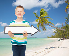 Image showing smiling little boy with blank arrow pointing right