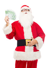 Image showing man in costume of santa claus with euro money