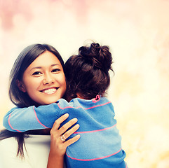 Image showing hugging mother and daughter