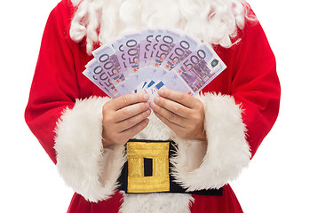 Image showing close up of santa claus with euro money