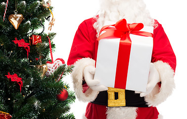 Image showing man in costume of santa claus with gift box