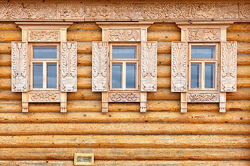 Image showing Windows on the wooden house facade. Old Russian country style