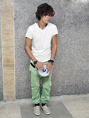 Image showing Street musician with tambourine in the subway