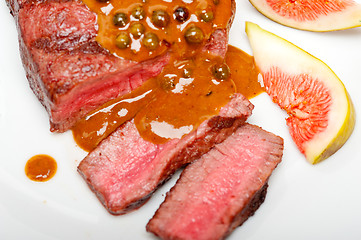 Image showing green peppercorn beef filet mignon