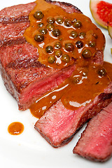 Image showing green peppercorn beef filet mignon