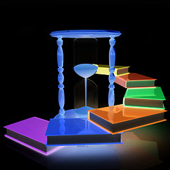 Image showing Hourglass and books