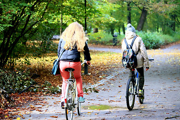 Image showing Young couple with bicycles 