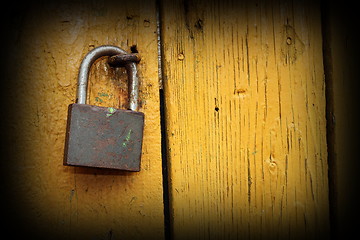 Image showing metallic lock on wooden door