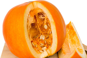 Image showing Ripe cut the pumpkin on a white background. 