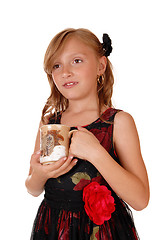 Image showing Girl holding a mug.