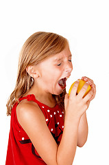 Image showing Girl like to eat an apple.