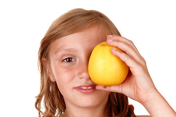 Image showing Girl playing with apple.