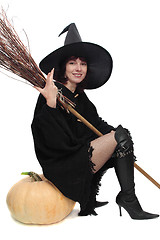 Image showing Pretty witch sitting