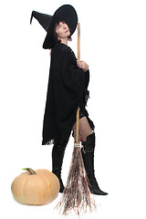 Image showing Witch posing with a broom