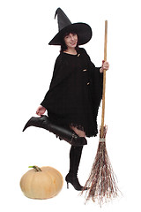 Image showing Witch standing on one leg