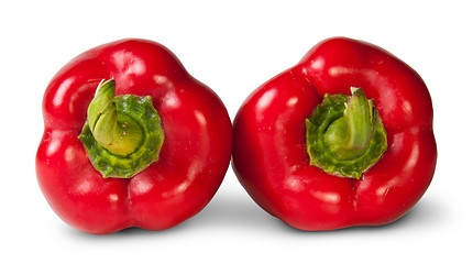 Image showing Two Red Bell Peppers Lying Beside