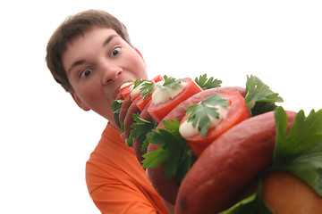 Image showing Boy eating crazy sandwich