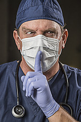 Image showing Secretive Doctor Wearing Protective Head Wear