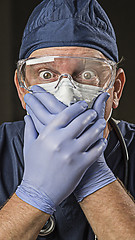 Image showing Stunned Doctor or Nurse with Protective Wear and Stethoscope