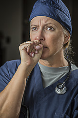 Image showing Concerned Looking Female Doctor or Nurse