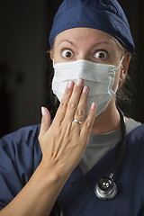 Image showing Shocked Female Doctor with Hand in Front of Mouth