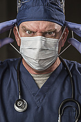 Image showing Determined Looking Doctor or Nurse with Protective Wear and Stet