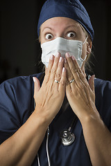 Image showing Shocked Female Doctor with Hands in Front of Mouth