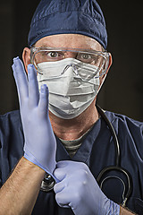 Image showing Determined Looking Doctor or Nurse with Protective Wear and Stet