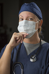 Image showing Female Doctor or Nurse Wearing Protective Face Mask 