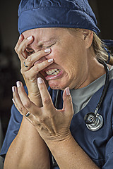 Image showing Agonizing Crying Female Doctor or Nurse