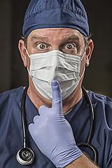 Image showing Stunned Doctor or Nurse with Protective Wear and Stethoscope