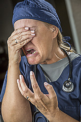 Image showing Agonizing Crying Female Doctor or Nurse