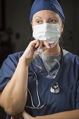 Image showing Female Doctor or Nurse Wearing Protective Face Mask 