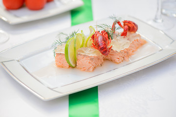 Image showing Fish dish and crayfish on the festive table