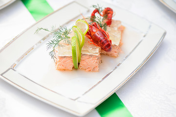 Image showing Fish dish and crayfish on the festive table