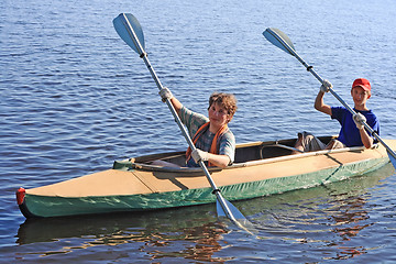Image showing Two boys on a kayak