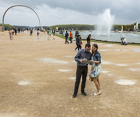 Image showing Couple Visiting a French Garden