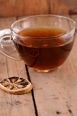 Image showing A cup of tea on wooden background