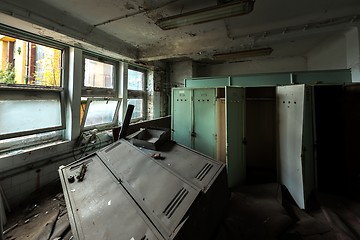 Image showing Dark room with steel lockers