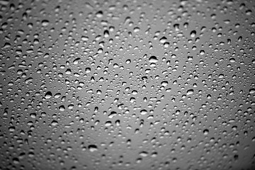 Image showing Natural water drops on glass