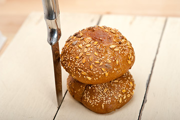 Image showing organic bread over rustic table