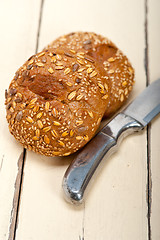 Image showing organic bread over rustic table