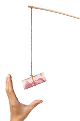 Image showing Baiting with Chinese money