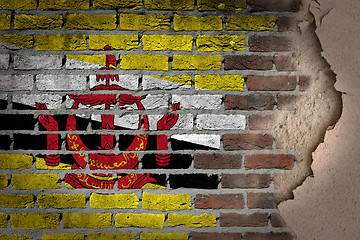 Image showing Dark brick wall with plaster - Brunei